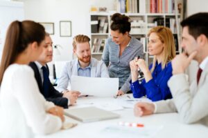 Team meeting in a bright office setting.